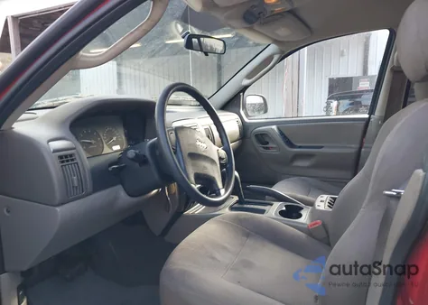 2004 Jeep Grand Cherokee Laredo z USA, uszkodzony, nr VIN 1J4GX48S54C117630